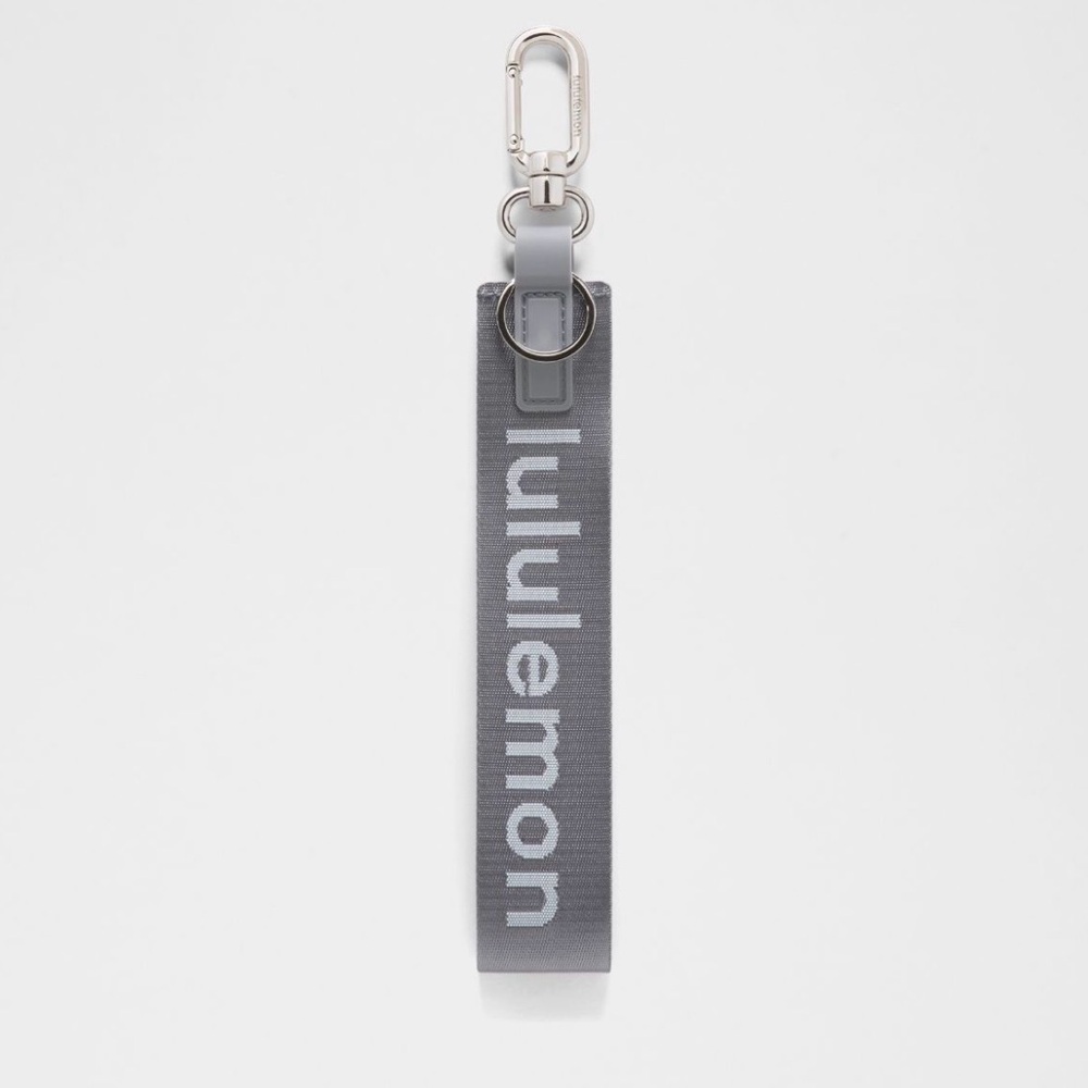 Lululemon Never Lost keychain NWT solar grey/starch blue